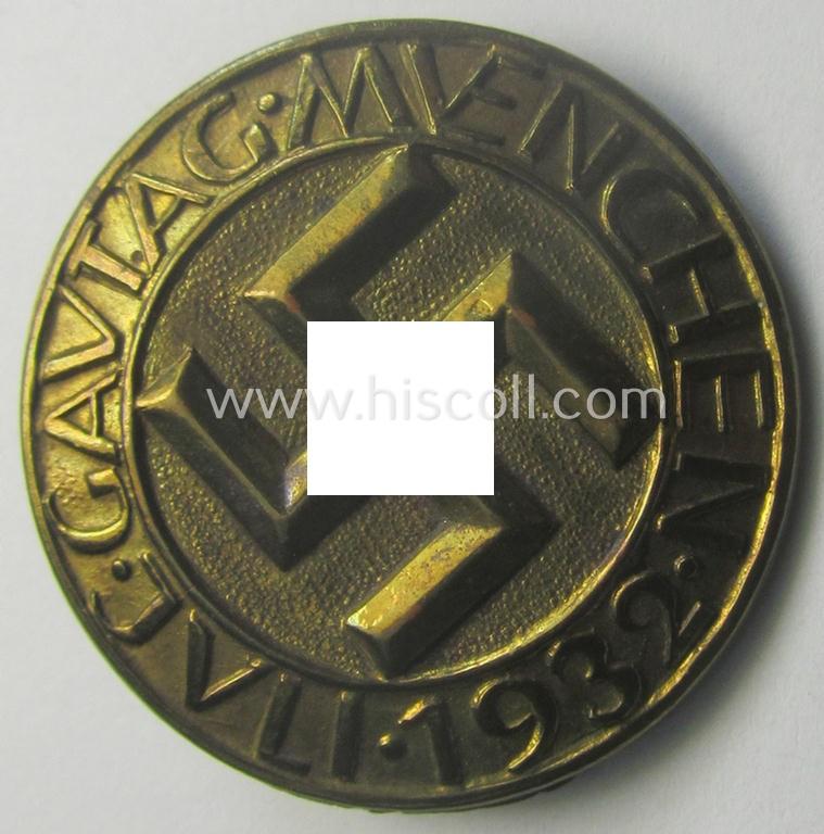 Unusually-found - luxuriously-styled, very detailed and pronounced! - golden-bronze-toned, N.S.D.A.P.-related day-badge (ie. 'tinnie' or: 'Veranstaltungsabzeichen') as was issued to commemorate the: 'Gautag.Muenchen.Juli 1932'