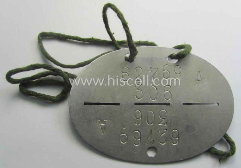 Aluminium-based, WH (LW) ie. 'Fallschirmjäger'-related ID-disc bearing the clearly stamped- and/or: 'coded'-unit- ie. 'MOB'-designation that reads: '62769' (and as such belonging to the: '7./Fsch.Jg.Rgt. 3')