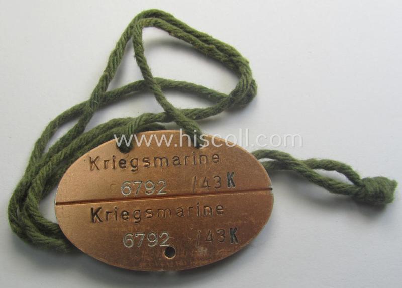 Mid-war- (albeit 'standard-issue'-) pattern, WH (Kriegsmarine) typical aluminium-based- and/or bright golden-bronze toned ID-disc (ie. 'Erkennungsmarke') bearing the engraved coded numeral (ie. text) that simply reads: 'Kriegsmarine 6792/43K'