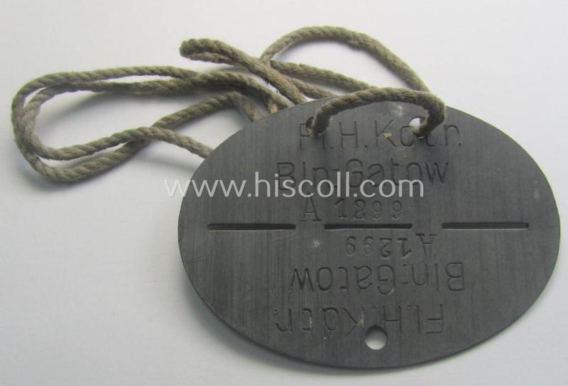 Zinc-based, WH (LW) ie. 'Flieger o. Geschwader'-related ID-disc bearing the clearly stamped unit-designation that simply reads: 'Fl.H.Kdtr. Bln.-Gatow' (and as such belonging to a staff-member serving at the famous airfield: 'Berlin-Gatow')