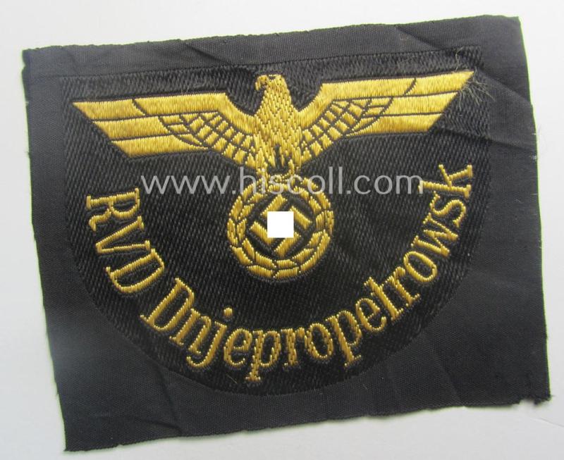 RB- ('Reichsbahn'-) related arm-eagle as executed in 'BeVo'-weave style, as was intended for an official of the: 'Deutsche Reichsbahn' ie. the: 'RVD Dnjepropetrowsk' (or: 'Reichsverkehrsdirektion Dnjepropetrowsk')