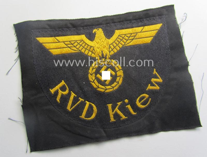 RB- ('Reichsbahn'-) related arm-eagle as executed in 'BeVo'-weave style, as was intended for an official of the: 'Deutsche Reichsbahn' ie. the: 'RVD Kiew' (or: 'Reichsverkehrsdirektion Kiew')