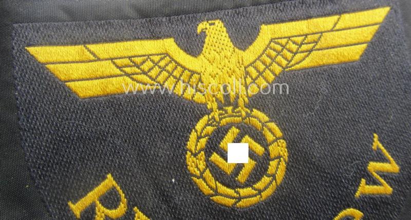 RB- ('Reichsbahn'-) related arm-eagle as executed in 'BeVo'-weave style, as was intended for an official of the: 'Deutsche Reichsbahn' ie. the: 'RVD Kiew' (or: 'Reichsverkehrsdirektion Kiew')