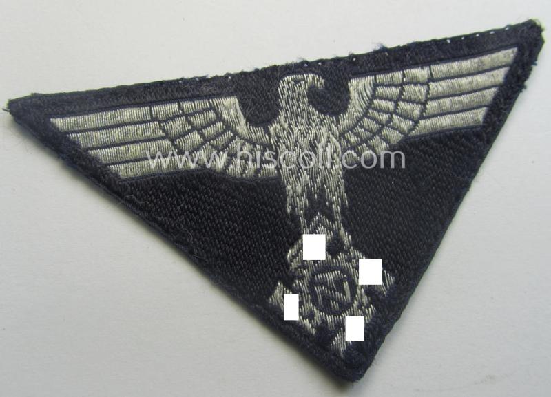 TeNo (ie. 'Technische Nothilfe') (I deem) officers'-pattern side-cap-eagle (ie. 'Adler für Offiziers-Schiffchen') being an example as executed in so-called: 'BeVo'-weave, 'flat-wire'-pattern on a darker-blue-coloured background