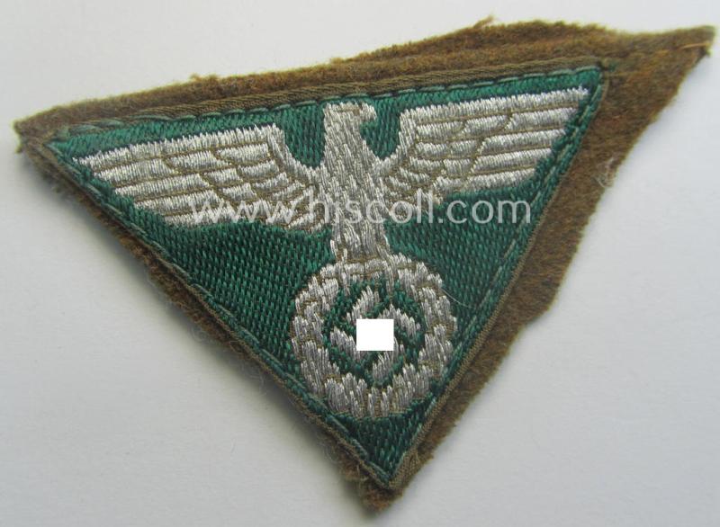 'Cut-out' example of an SA-related cap-eagle as intended for the: 'Lagermütze' (ie. side-cap) being an example as woven in darker-green on a brownish-coloured background and as such intended for members within the: 'SA-Gruppe Kurpfalz o. Nordsee'