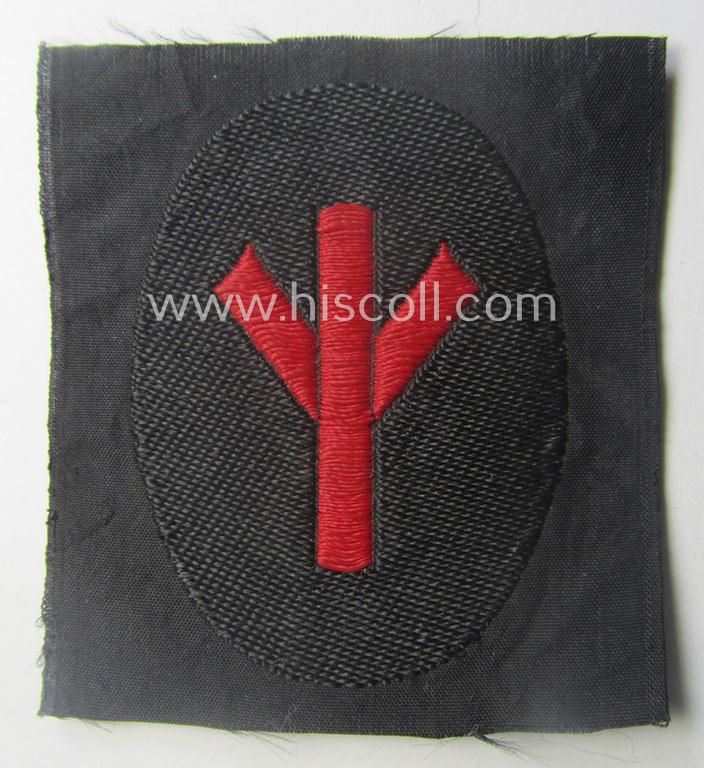 N.S.K.K.- (ie. 'National-Socialistisches Kraftfahr-Korps'-) related armbadge as was intended for an: 'N.S.K.K.-Sanitäts-Unterführer o. Mann' (ie. 'Feldscher') that still retains its 'RzM'-etiket