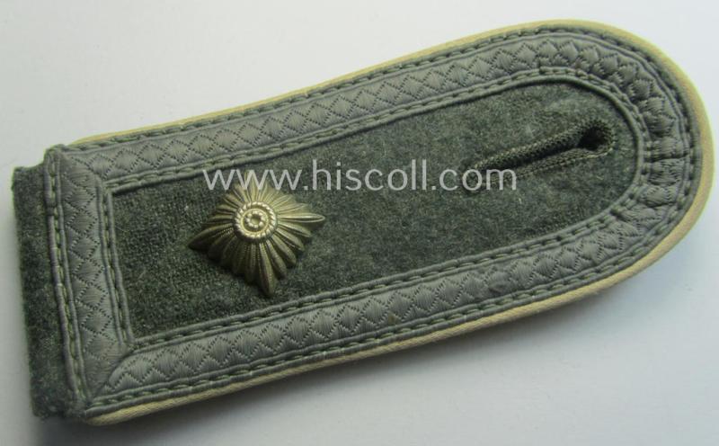 Single, WH (Heeres) NCO-type (ie. 'M40'- ie. 'M43'-pattern) shoulderstrap having the white-coloured branchcolour as was intended for - and clearly worn by! - a: 'Feldwebel der Infanterie-Trpn.'