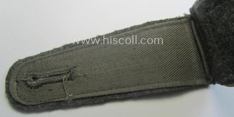 Single, WH (Heeres) NCO-type (ie. 'M40'- ie. 'M43'-pattern) shoulderstrap having the white-coloured branchcolour as was intended for - and clearly worn by! - a: 'Feldwebel der Infanterie-Trpn.'
