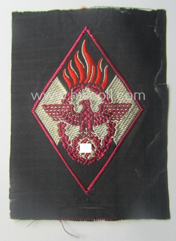 HJ ('Hitlerjugend') 'Feuerwehr Formationsabzeichen' (or: youth fire-fighter badge ie. 'Raute') as neatly executed in 'BeVo'-weave pattern and that still shows its period-attached 'RzM'-etiket