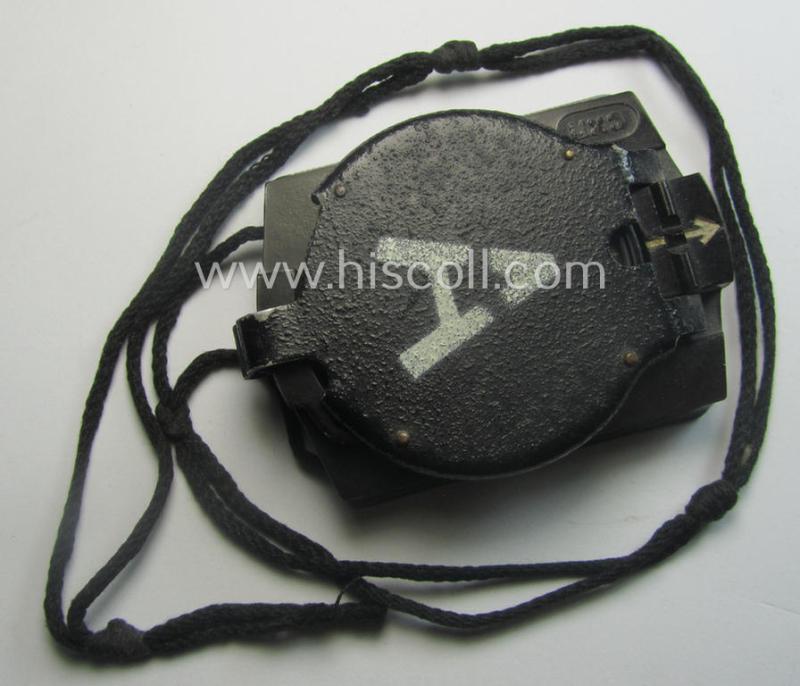 'Standard-issue'-pattern WH compass (or: 'Marschkompass') as executed in black-coloured 'Bakelite' being - I deem - a later-war-period- and/or maker- (ie. 'CXN'-) marked example that comes mounted on its period cord