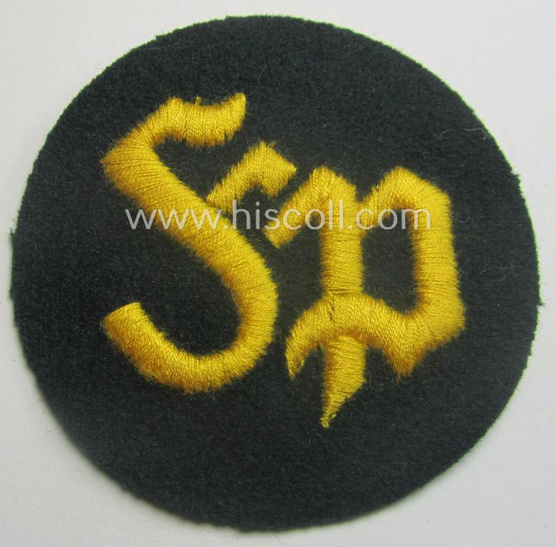 WH (Heeres) so-called: trade- and/or special-career arm-insignia as was intended for a: 'Festungspionier-Feldwebel' (being a neatly machine-embroidered 'variant' as mounted on darker-green-coloured wool)