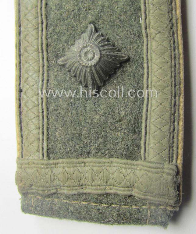 Single, WH (Heeres) NCO-type (ie. 'M40'- ie. 'M43'-pattern) shoulderstrap having the white-coloured branchcolour as was intended for - and clearly worn by! - a: 'Feldwebel der Infanterie-Trpn.'