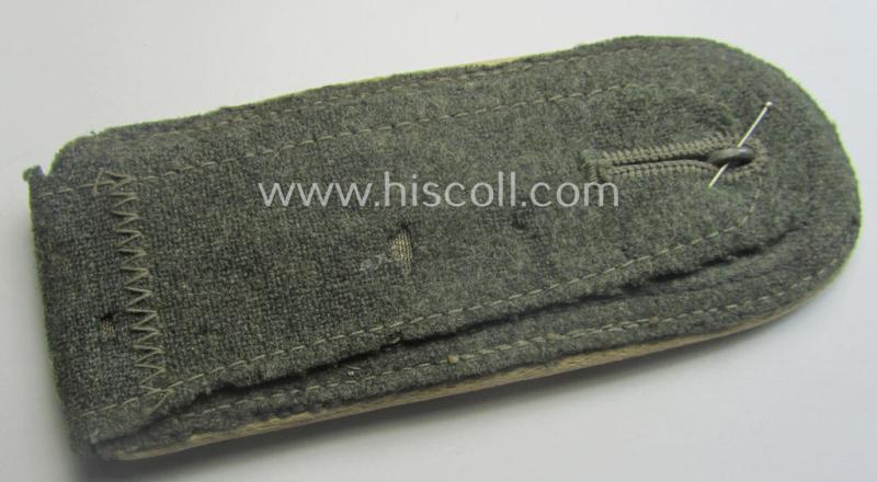 Single, WH (Heeres) NCO-type (ie. 'M40'- ie. 'M43'-pattern) shoulderstrap having the white-coloured branchcolour as was intended for - and clearly worn by! - a: 'Feldwebel der Infanterie-Trpn.'