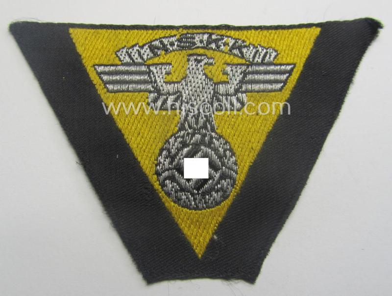 Never used - ie. 'virtually mint'! - so-called: N.S.K.K. (ie. 'National Soc. Kraftfahr Korps') side-cap-eagle (ie. 'Adler für Schiffchenmütze') being a 'flat-wire-woven'-example that comes mounted onto a bright-yellow-coloured background