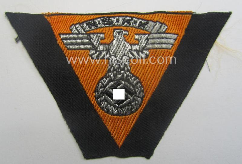 Never used - ie. 'virtually mint'! - so-called: N.S.K.K. (ie. 'National Soc. Kraftfahr Korps') side-cap-eagle (ie. 'Adler für Schiffchenmütze') being a 'flat-wire-woven'-example that comes mounted onto a orange-yellow-coloured background