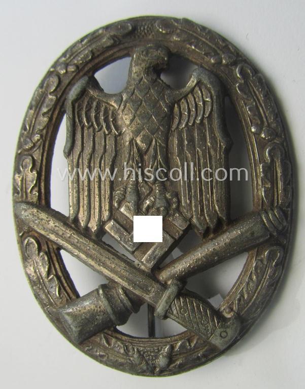 'Allgemeines Sturmabzeichen' (or: General Assault Badge ie. GAB) being a typical unmarked, zinc-based- (ie. 'Feinzink'-) and/or: 'semi-hollow-back'-version as was (I deem) produced by the: 'Rudolf Karneth'-company