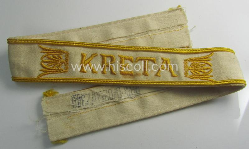 WH cuff-title (ie. 'Ärmelstreifen') entitled: 'Kreta' (being an example that bears a printed 'RbN.'-numeral) and that comes in a surely issued albeit simply never worn nor once tunic-attached, condition