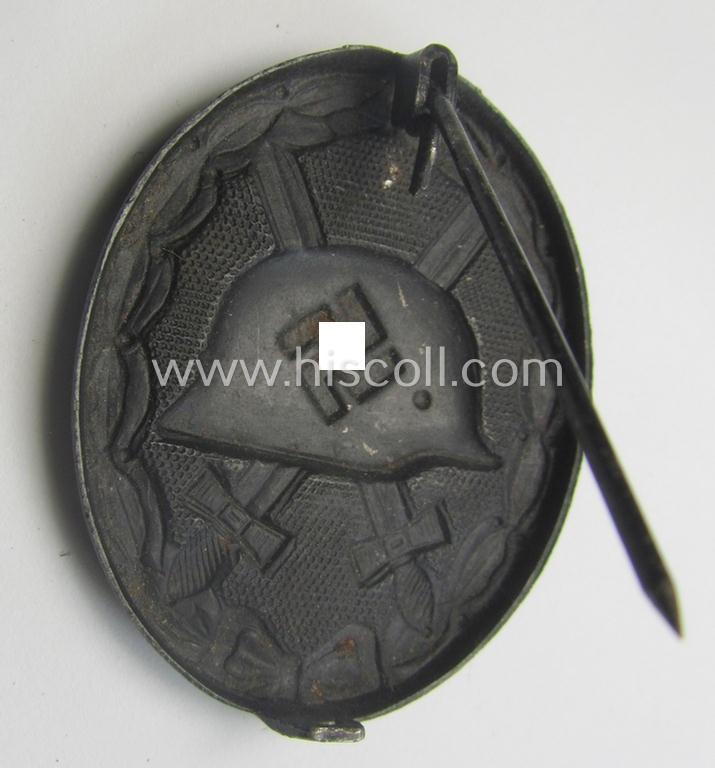 Moderately used- and/or worn black-class wound-badge (or: 'Verwundeten-Abzeichen in Schwarz') being a typical non-maker-marked example