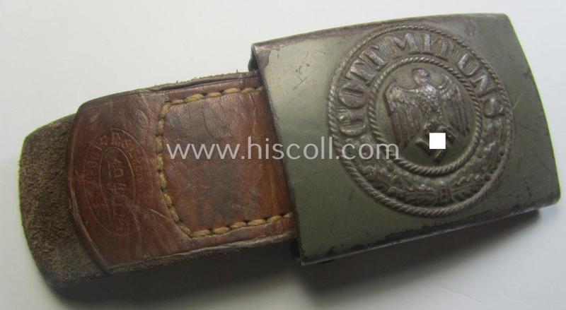 WH (Heeres) field-grey-toned- and steel-based belt-buckle being a maker- (ie. 'R.S.&S.'-) marked example that comes mounted onto its 'R. Sieper u. Söhne'-marked and/or '1940'-dated tab