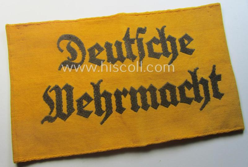Linnen-based- and/or neatly 'BeVo'-woven, golden-yellow-coloured armband (ie. 'Armbinde') entitled: 'Deutsche Wehrmacht' as was intended for (civilian) staff-members serving within the German armed forces ie. 'Deutsche Wehrmacht'