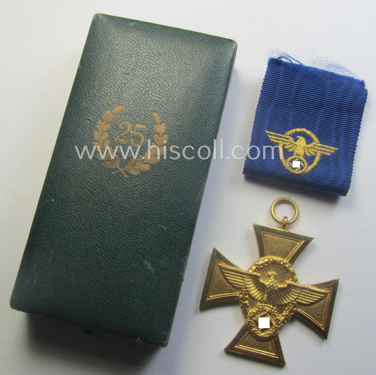 Golden-class 'Pol.-Dienstauszeichnung 1. Stufe' (or: police loyal-service medal first-class) that comes stored in its period, green-coloured (and luxuriously styled!) etui and that comes with its accompanying ribbon (ie. 'Bandabschnitt')