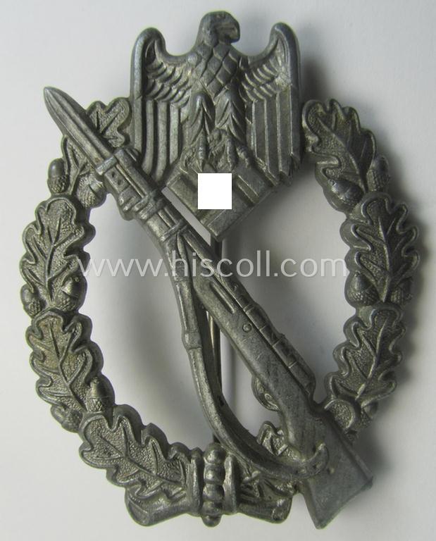 Silver-class 'Infanterie Sturmabzeichen in Silber' being a (typically) unmarked so-called: 'pillow-crimped'-pattern example as was executed in silverish-coloured, zinc-based metal (ie. 'Feinzink')