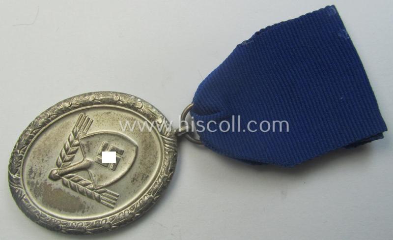 RAD (ie. 'Reichsarbeitsdienst') so-called: 'Dienstauszeichnung 3. Stufe für Männer' (as was intended for 12 years loyal-service) and that came mounted onto its period piece of ribbon (ie. 'Bandabschnitt')