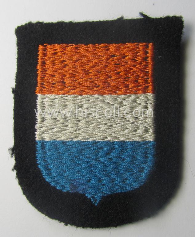 'Variant'-pattern, Dutch, Waffen-SS 'volunteer' arm-shield as was specifically intended for usage by soldiers of the: '23. SS Freiwilligen Panzer Grenadier Division' ('Nederland')