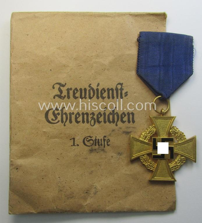 'Treuedienst Ehrenzeichen 1. Klasse' that comes stored in its maker- (ie. 'Wilh. Deumer'-) marked- and/or 'Zellstoff'-based pouch