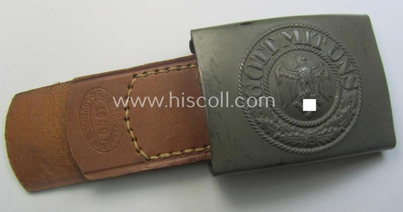 'Virtually mint', 'standard-issue'-pattern, WH (Heeres) field-grey-toned- and steel-based belt-buckle being a maker- (ie. 'R.S.&S.'-) marked example that comes mounted onto its 'R. Sieper u. Söhne'-marked and/or '1940'-dated tab