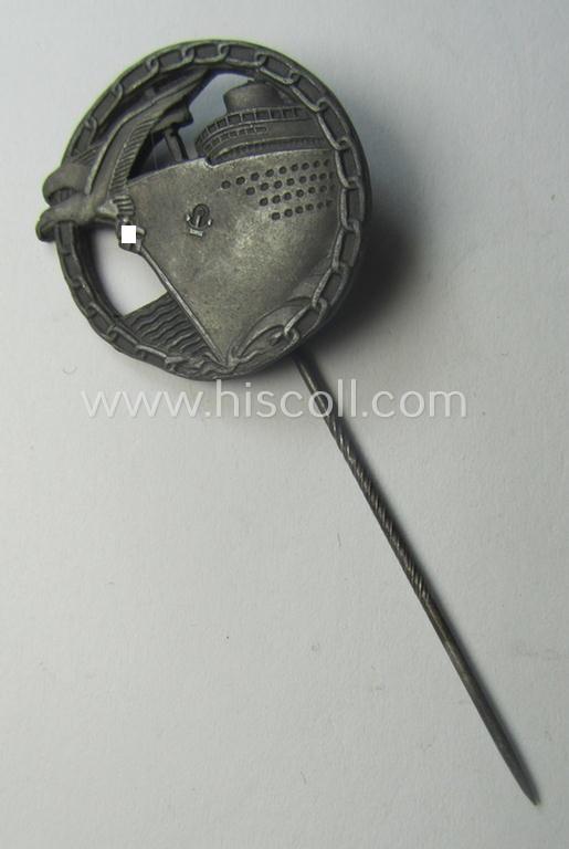 Smaller-sized example (ie. 'Halbminiatur') of a WH (KM) 'Blockadebrecher-Kriegsabzeichen' (or: blocade-runner war-badge) being a detailed, non-maker-marked example as executed in zinc-based metal (ie. 'Feinzink')