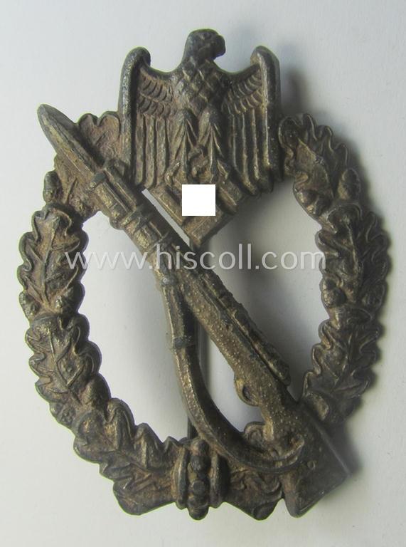'Infanterie Sturmabzeichen in Silber' being a non-maker-marked, 'solid-back' example as executed in silver-coloured, zinc-based metal as was produced by a (by me) unidentified maker