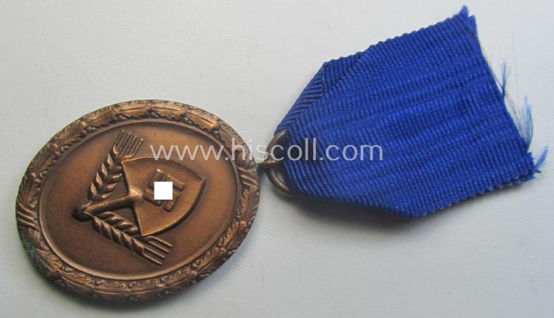 'Regular-weight', RAD (ie. 'Reichsarbeitsdienst'): 'Dienstauszeichnung 4. Stufe für Männer' as was intended for 4 years loyal-service and that comes mounted onto its period (albeit shortened) ribbon (ie. 'Bandabschnitt')