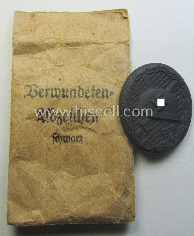 'Verwundeten-Abzeichen in Schwarz' being a clearly maker- (ie. '65'-) marked example by the: 'Klein & Quenzer'-company that came stored its (scarcely seen!) period pouch