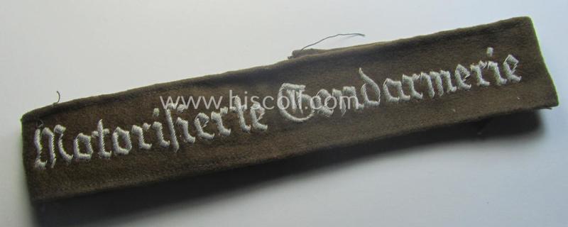 Truly used - and actually scarcely found! - police- ie. 'Gendarmerie'-related cuff-title ie. armband (ie. 'Ärmelstreifen') entitled: 'Motorisierte Gendarmerie' (being a hand-embroidered officers'- ie. evt. NCO-pattern example)