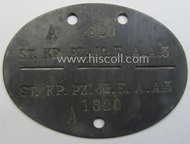 Zinc-based, WH (Heeres) 'Panzerjäger o. Aufklärungs'-related ID-disc bearing the clearly stamped unit-designation that reads: 'St.Kp.Pz.JG.E.A.A.3' and that comes as issued and/or worn
