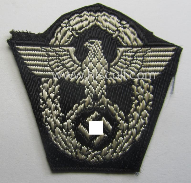 Polizei- (ie. 'SS-Polizei') cap-eagle (ie. 'Adler für Schiffchen o. Einheitsfeldmütze') being a clearly used- and/or cap-removed example