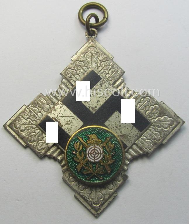 Most certainly unusually found, silver-toned (and neatly enamelled!) commemorative shooting-contest-medal that shows the period-engraved text: 'Tagesbester 1938'