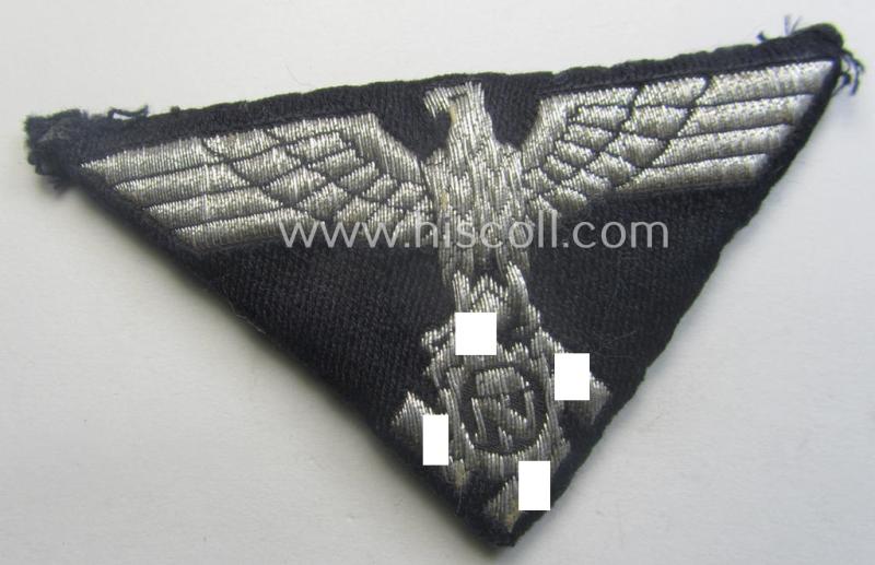 TeNo (ie. 'Technische Nothilfe') officers'-pattern arm-eagle (ie. 'Ärmeladler für Offiziere der TENO') being a (maker-marked!) example as executed in 'BeVo'-weave, 'flat-wire'-pattern onto a ('padded') darker-blue-coloured background