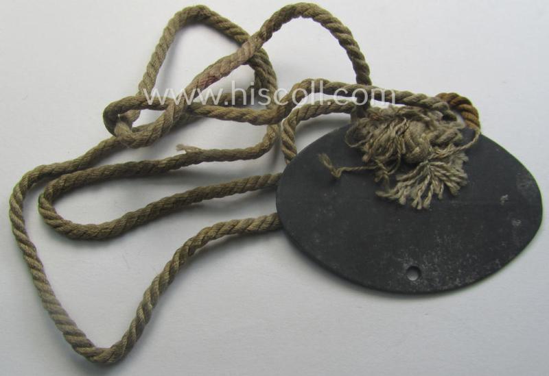 Interesting, early-war- (albeit 'standard-issue'-) pattern, WH (Kriegsmarine) typical zinc-based- and/or greyish-silver toned ID-disc (ie. 'Erkennungsmarke') bearing the engraved text that simply reads: 'Hans-Helge Hoffmann - San.Offz. Okt. 1941'