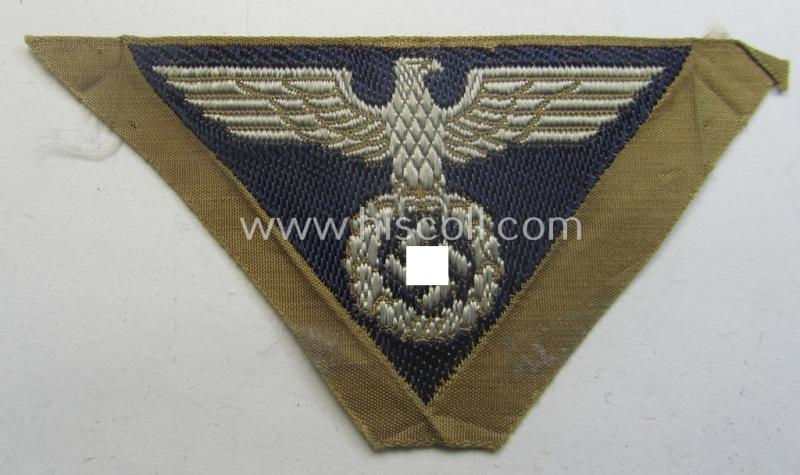 SA-related cap-eagle as was intended for the: 'Lagermütze' (ie. side-cap) being an example as woven on a typical darker-blue-coloured background and as such intended for members within the: 'SA-Gruppe Hansa o. Hessen'