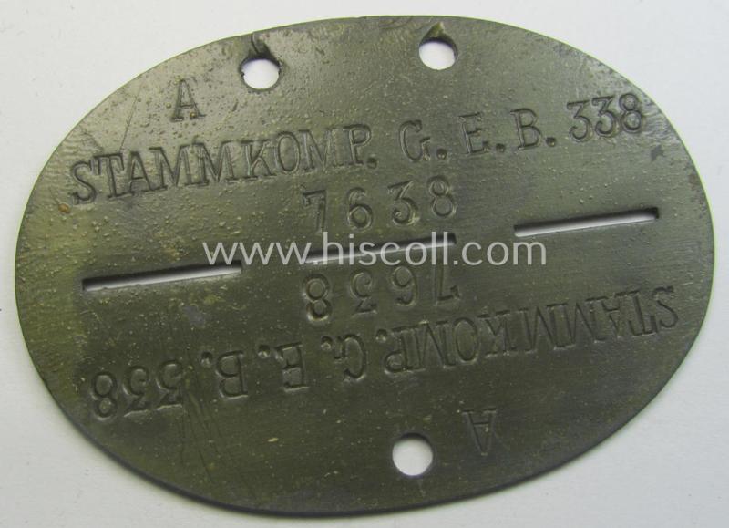 Zinc-based, WH (Heeres) 'Grenadiere'-related ID-disc bearing the clearly stamped unit-designation that reads: 'Stammkomp.G.E.B.338' and that comes as issued and/or worn