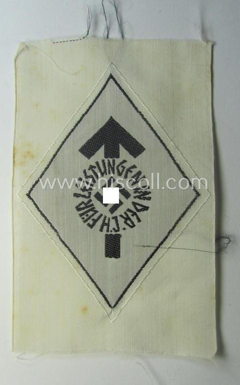 HJ- (ie. 'Hitlerjugend') 'Leistungsabzeichen in Schwarz in Stoff' that retains its 'RzM'-etiket