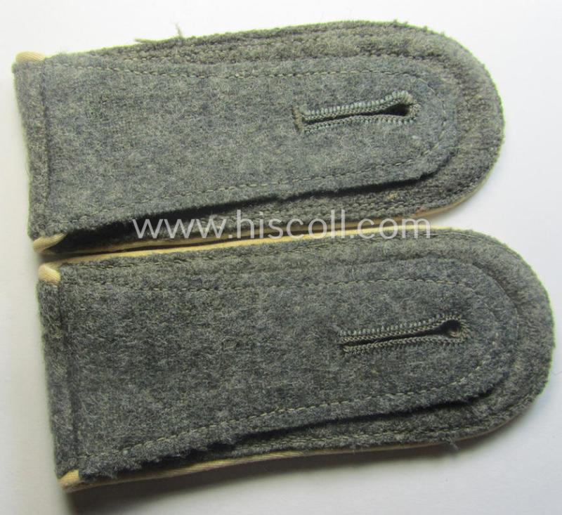 Pair of WH (Heeres), early- (ie. mid-) war-period- (ie. 'M40- o. M43'-) pattern NCO-type shoulderstraps as piped in the white-coloured branchcolour as was intended for an: 'Uffz. eines Infanterie-Rgts.'
