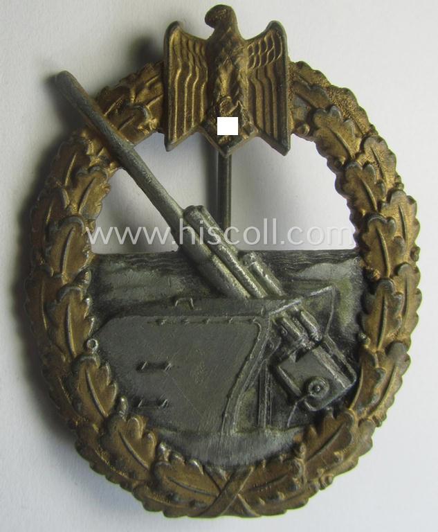 WH (Kriegsmarine) 'Marine-Artillerie-Abzeichen' being a non-maker-marked- and/or typical zinc- (ie. 'Feinzink'-) based example as was produced by the: 'Friedrich Linden'-company