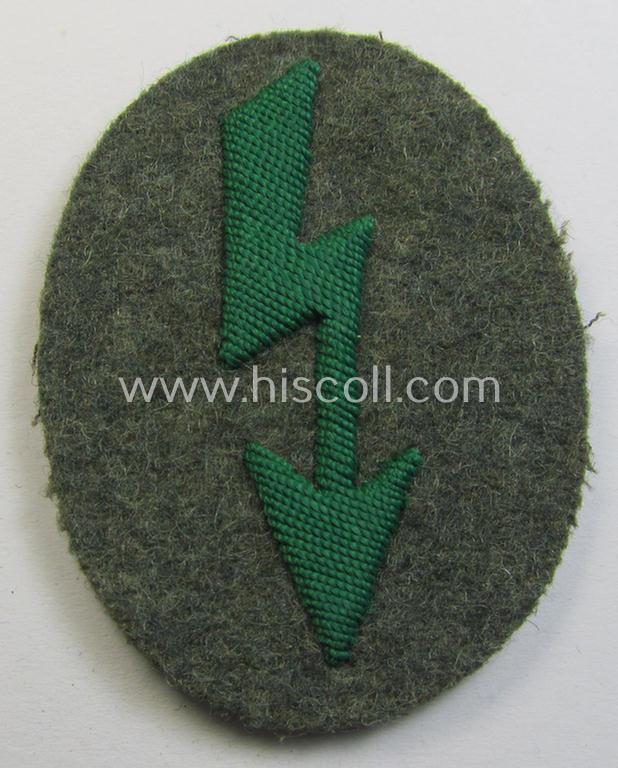WH (Heeres) trade- and/or special-career-insignia ie. hand-embroidered 'signal-blitz' being a non-maker-marked example as executed in green-coloured linnen as was specifically intended for a soldier within the: 'Jäger- o. Geb.Jäger-Trpn.'