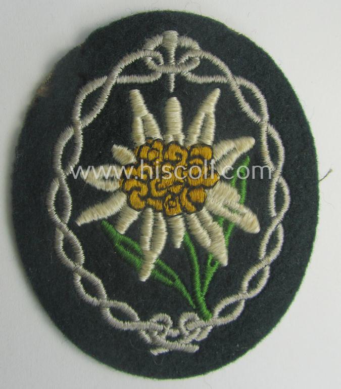 WH (Heeres) EM- (ie. NCO-) type: 'Edelweiss'-armpatch (being a machine-embroidered specimen)