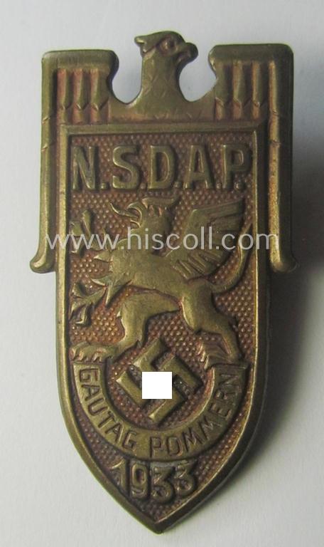 Commemorative - and fairly luxuriously styled! - golden-coloured, N.S.D.A.P.-related 'tinnie' being a maker- (ie. 'Walter Demmer'-) marked example depicting an illustration of an eagle and bearing the text: 'N.S.D.A.P. Gautag - Pommern - 1933'