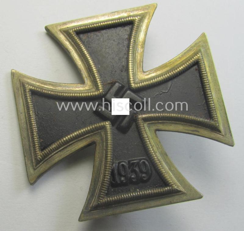 'Eisernes Kreuz 1. Kl.' (or: Iron Cross 1st class) being a (typical) maker- (ie. '7'-) marked example as was produced by the maker (ie. 'Hersteller'): 'Paul Meybauer'