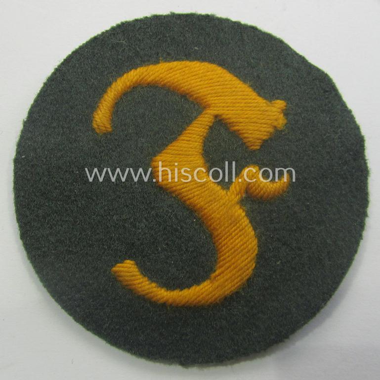 WH (Heeres) so-called: trade- and/or special-career arm-insignia (ie. 'Laufbahn- o. Tätigkeitsabzeichen') as was specifically intended for an army: 'Feuerwerker' (ie. artician)